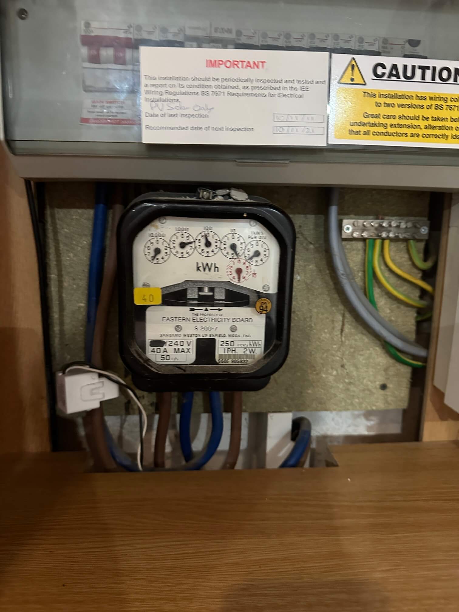 Old analogue solar generation meter before replacement at a Norwich property