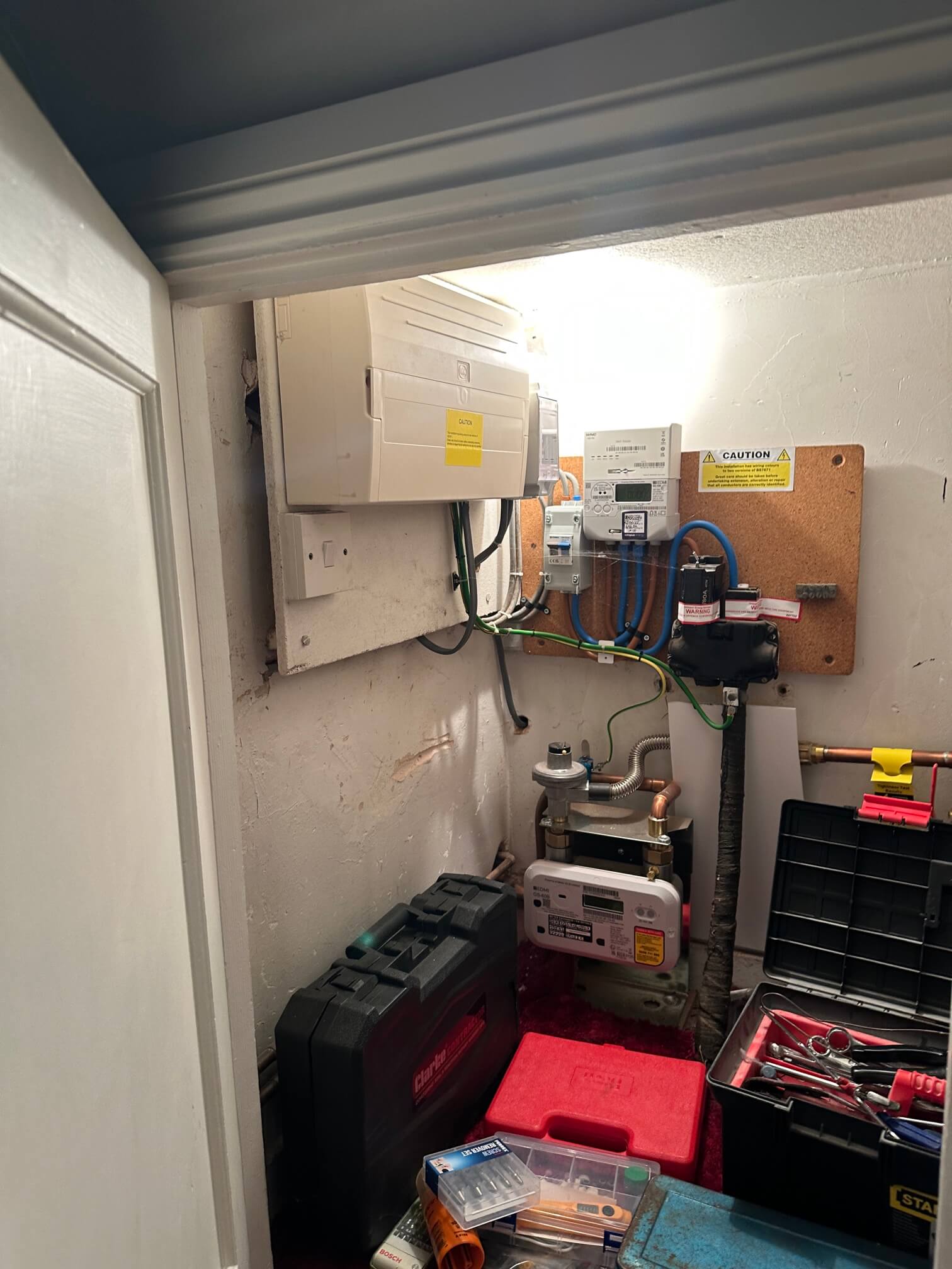 Existing electricity supply and meter equipment assessed before connecting the Norwich garden music room.