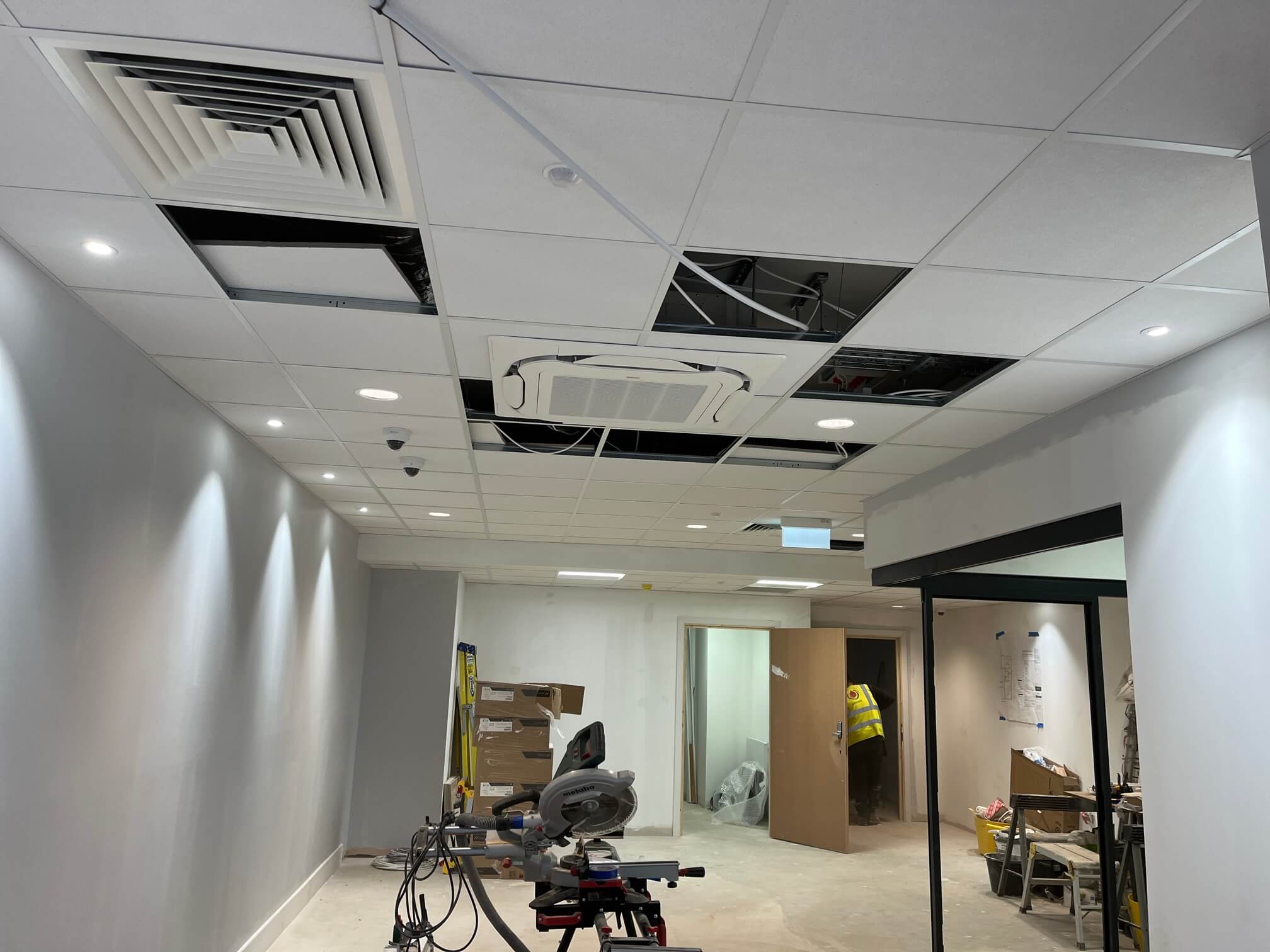 Recessed LED lighting and ceiling cassette air conditioning in the Banking Hub