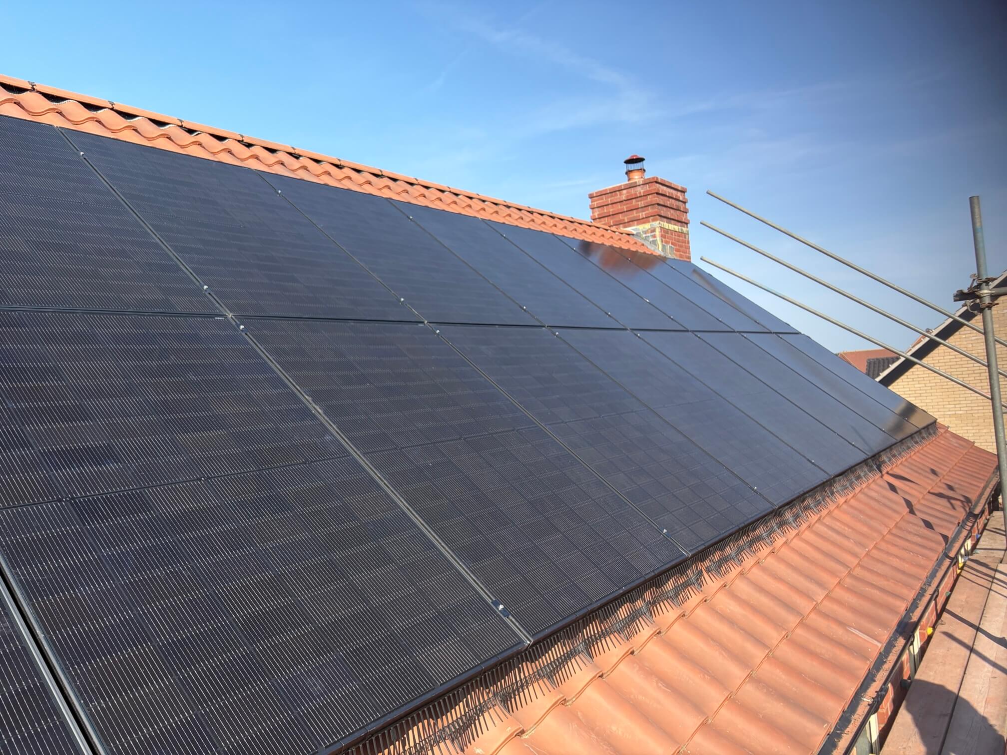 Completed roof-mounted solar panel array on a Great Ellingham home