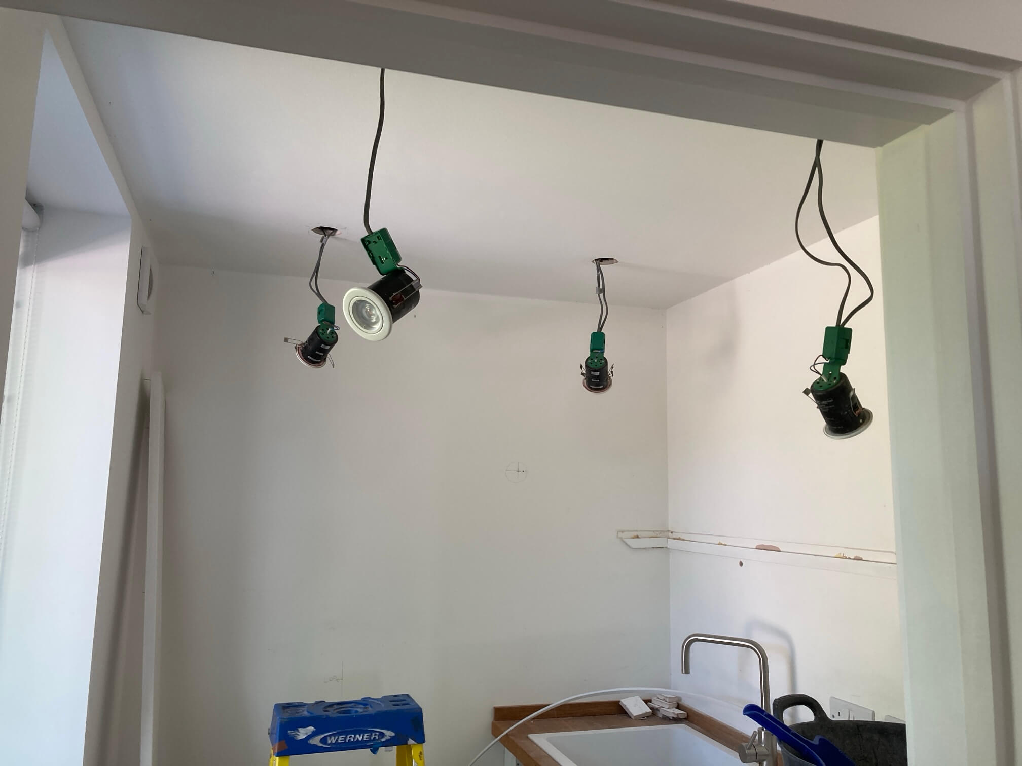 Removed downlights and prepared lighting cables in the utility room