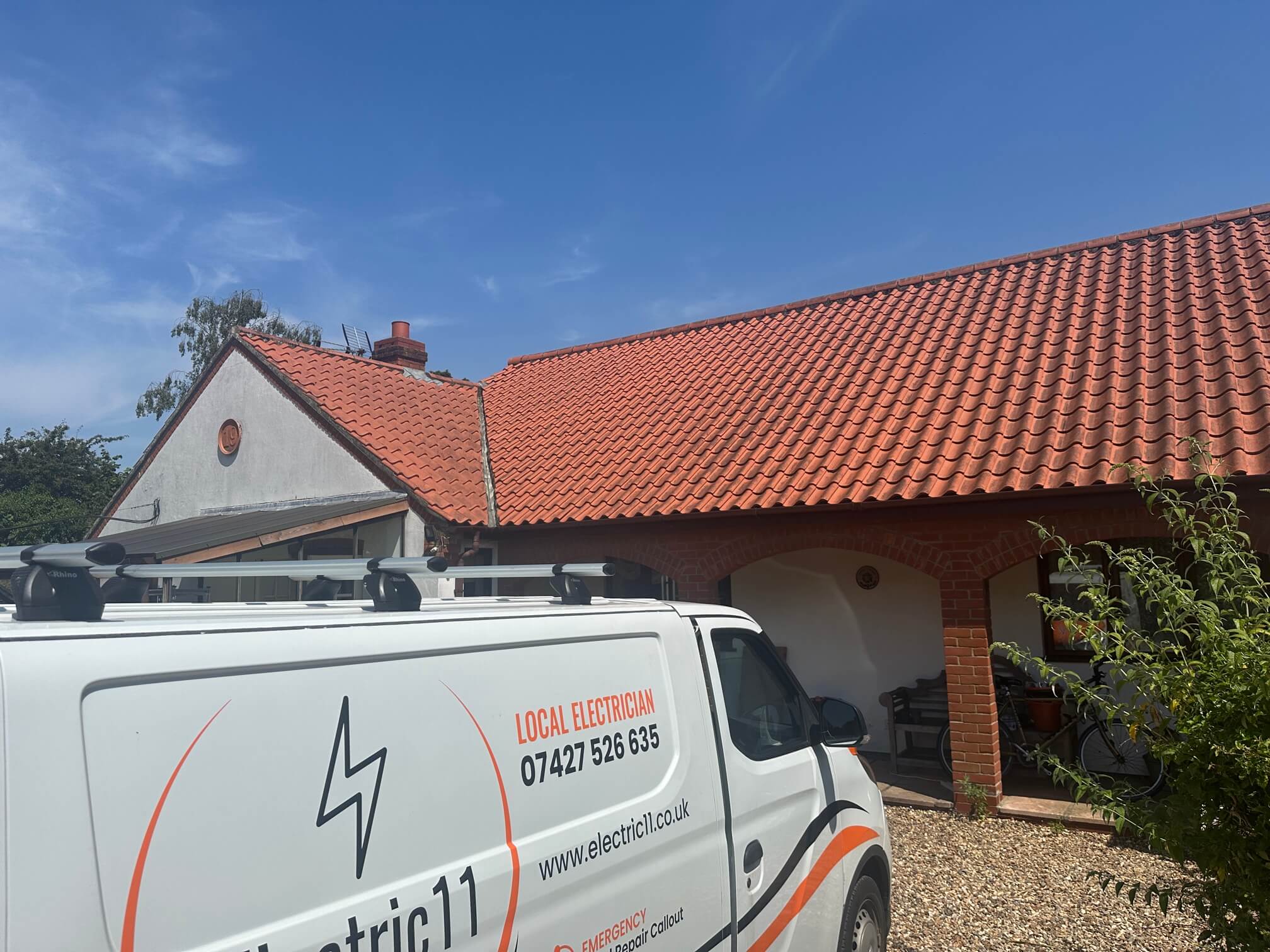 Electric11 van outside the Diss property during the solar survey
