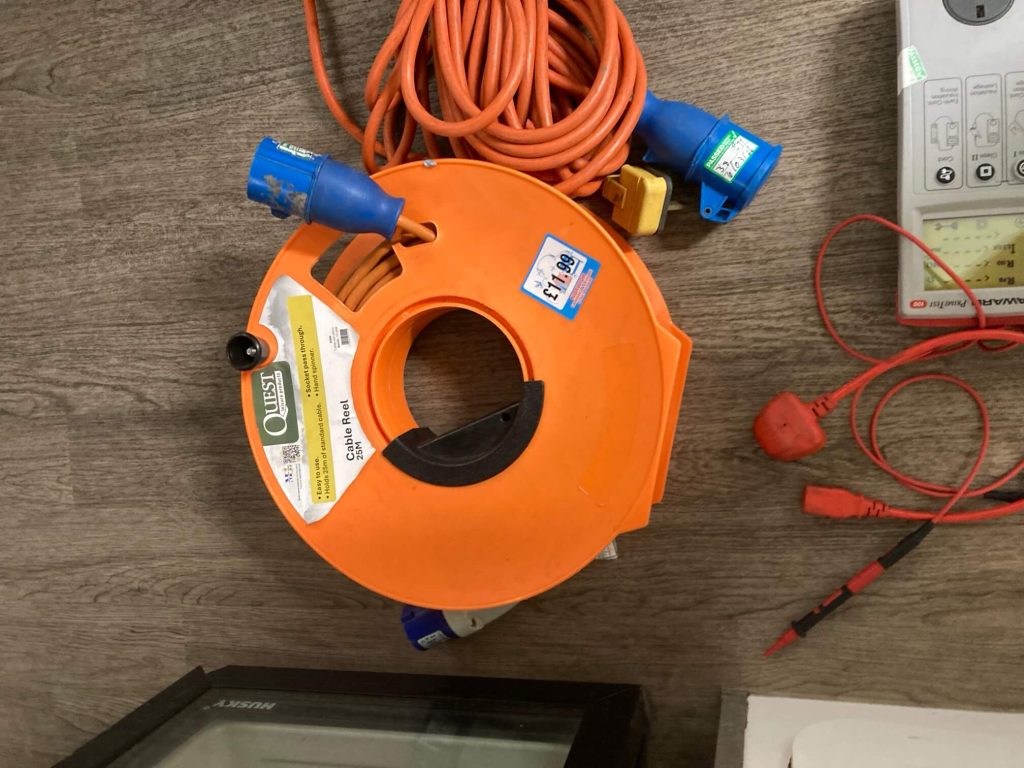 Commercial extension reel and industrial leads checked during PAT testing