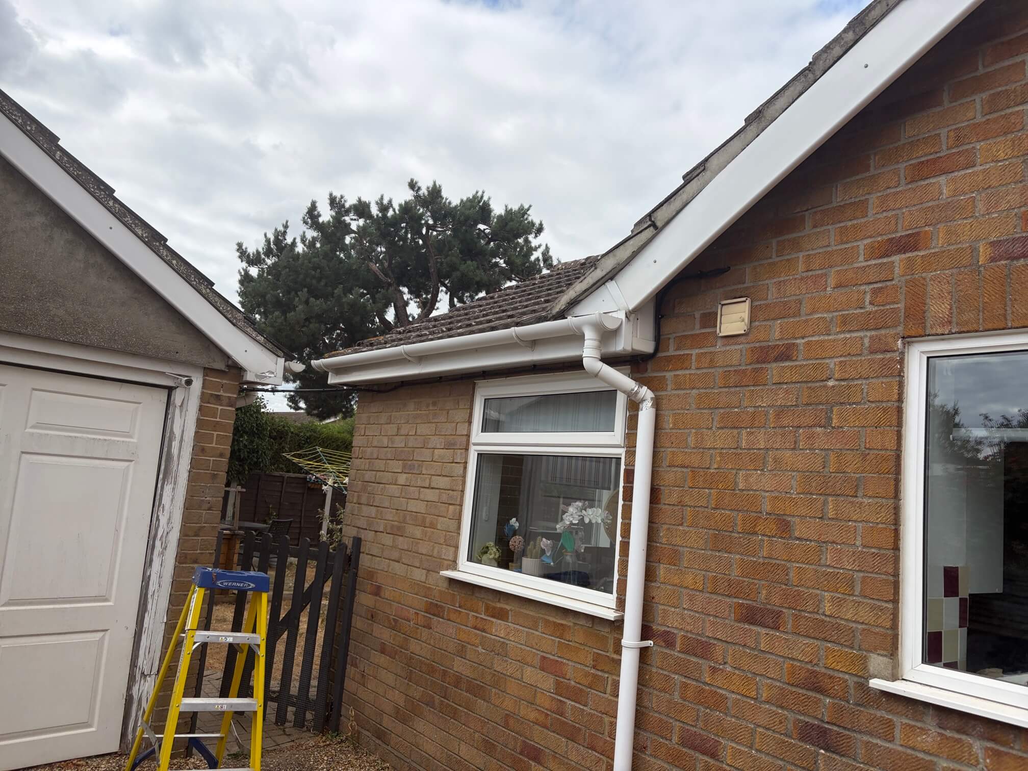 Completed cable route between the garage and house in Attleborough