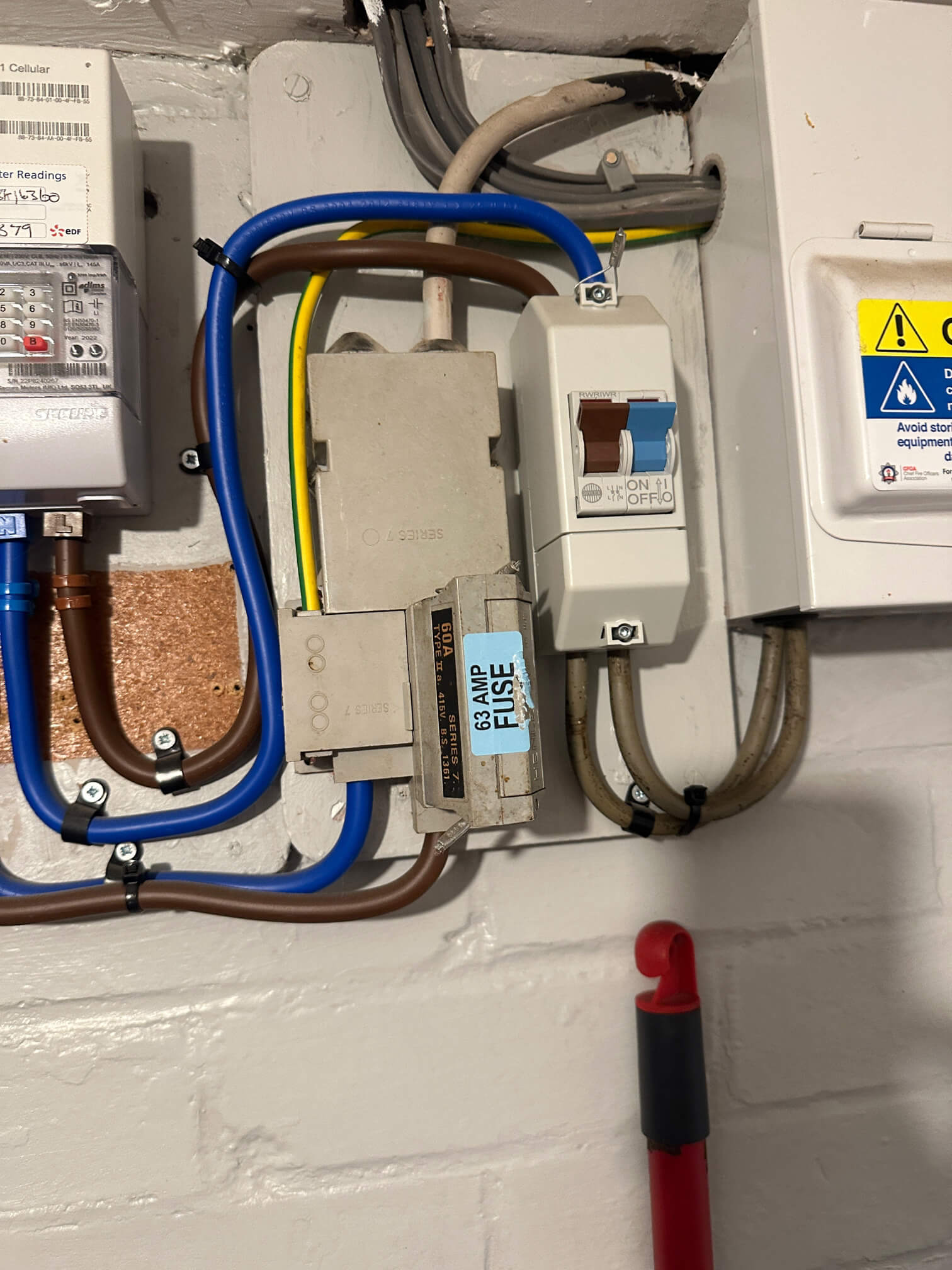 Existing meter and supply equipment photographed for a home EV charger project near Diss